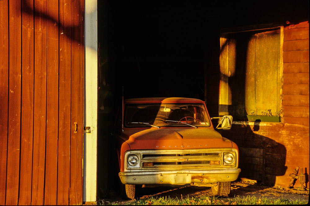 red truck in red barn