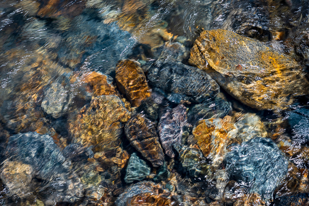 Colorful mountain stream. It uses a full spectrum of color.