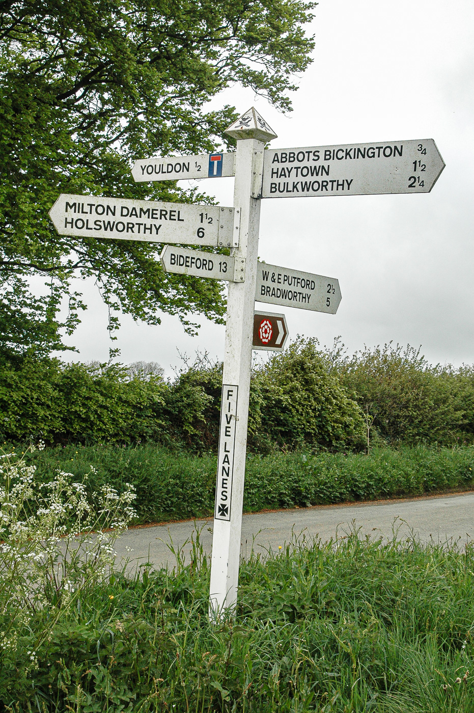Confusing sign post. Many ways.